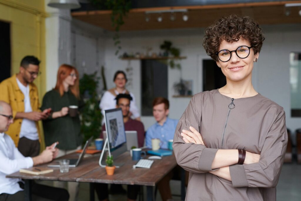 Happy business woman taking the lead